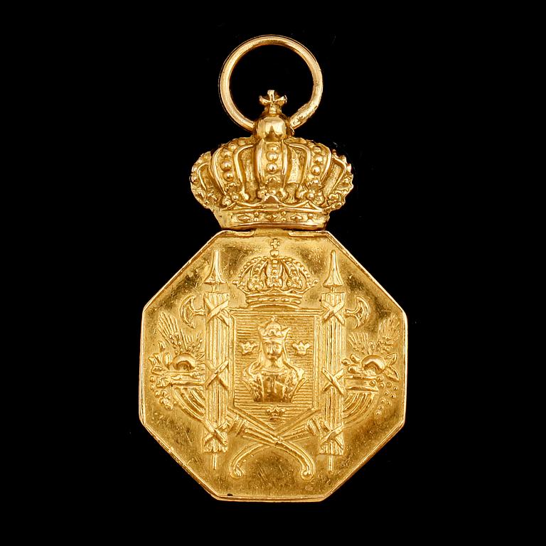 MEDALJ, 18 k guld, 1948. Vikt ca 4 g.