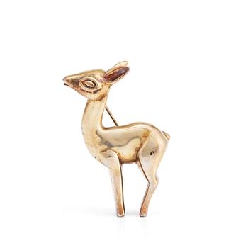 409. Estrid Ericson, a gilt pewter brooch of a deer, Svenskt Tenn, Sweden.