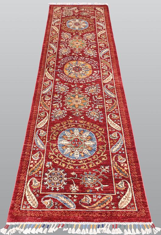 A carpet, Ziegler, c. 307 x 78 cm.