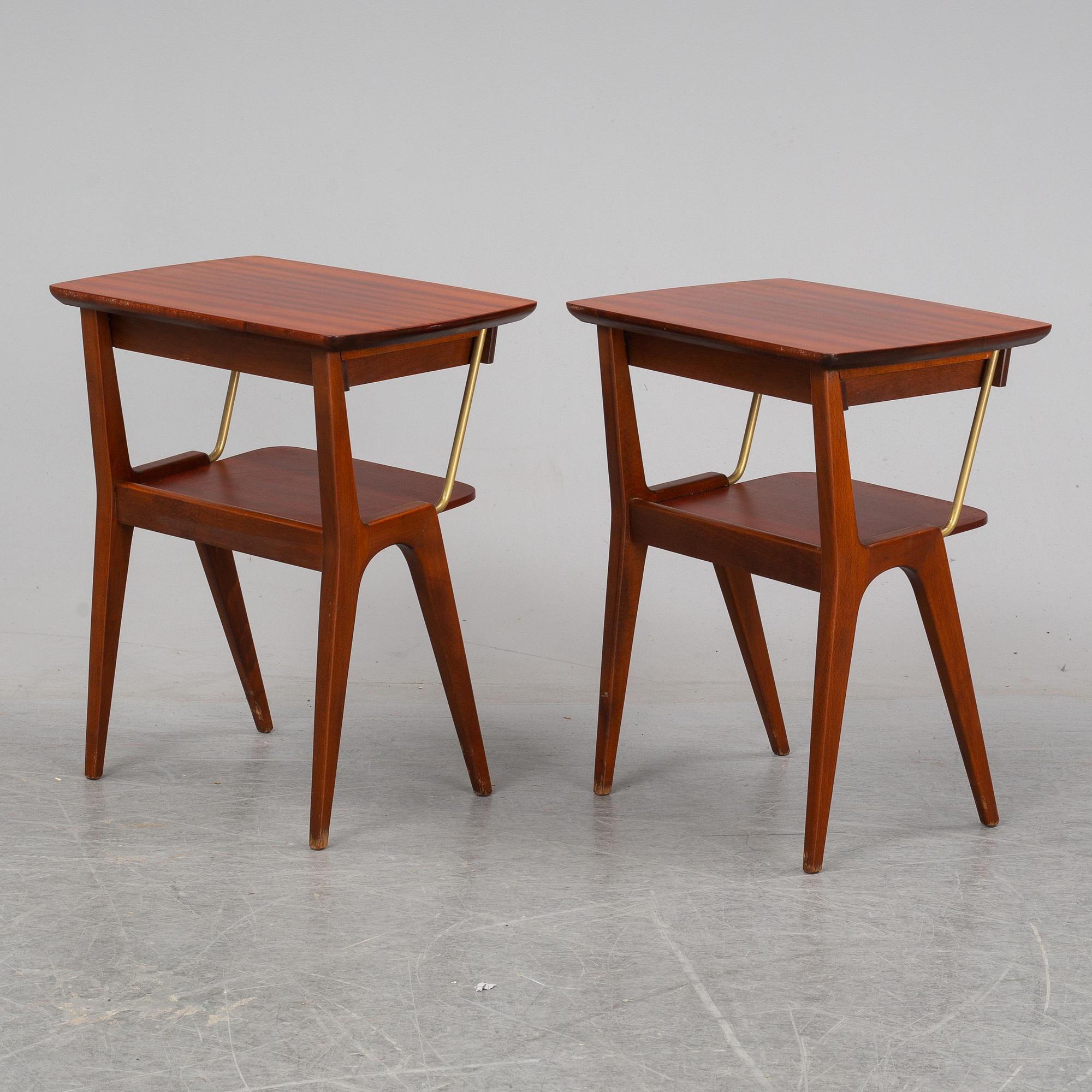 A 1940/50's pair of mahogany bedside tables.