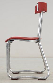 A Gio Pontio tubular aluminium and red vinyl chair, Ditta Parma Antonio e Figli, Saronno, Italy.