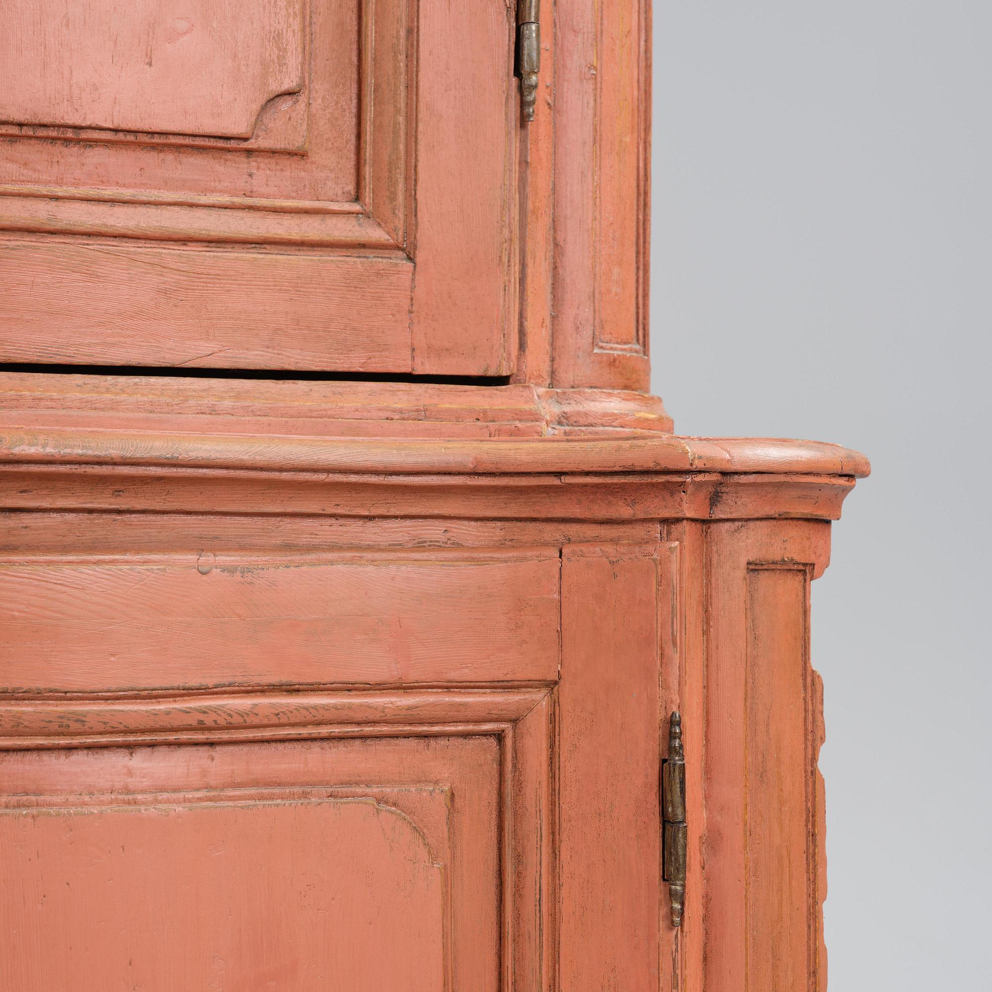 A rococo corner cabinet, later part 18th century.