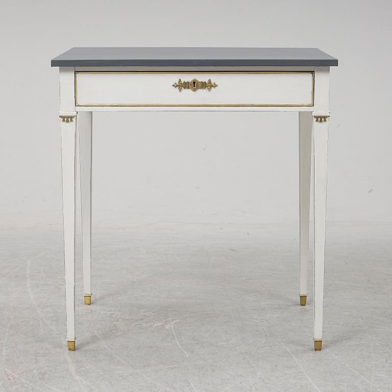 A Gustavian style table, first half of the 20th century.