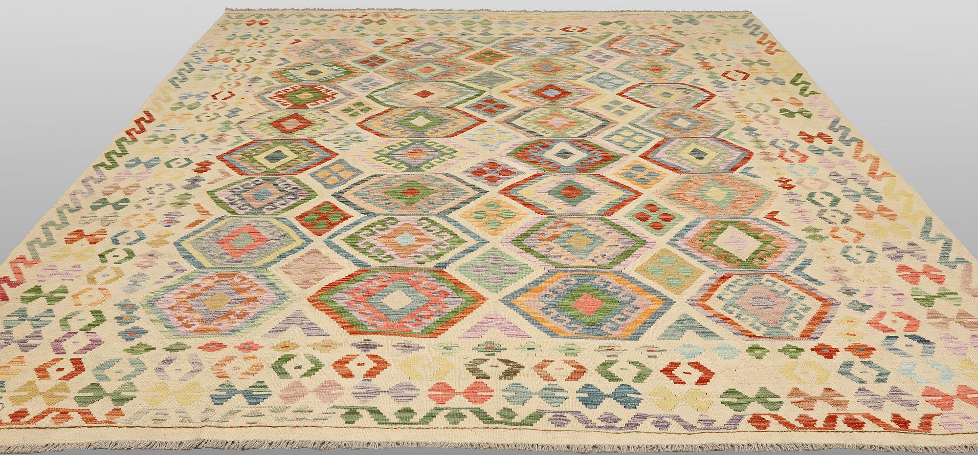 A Kilim carpet, 288 x 250 cm.