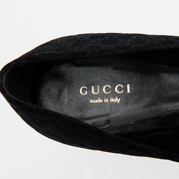 SKOR, Gucci.
