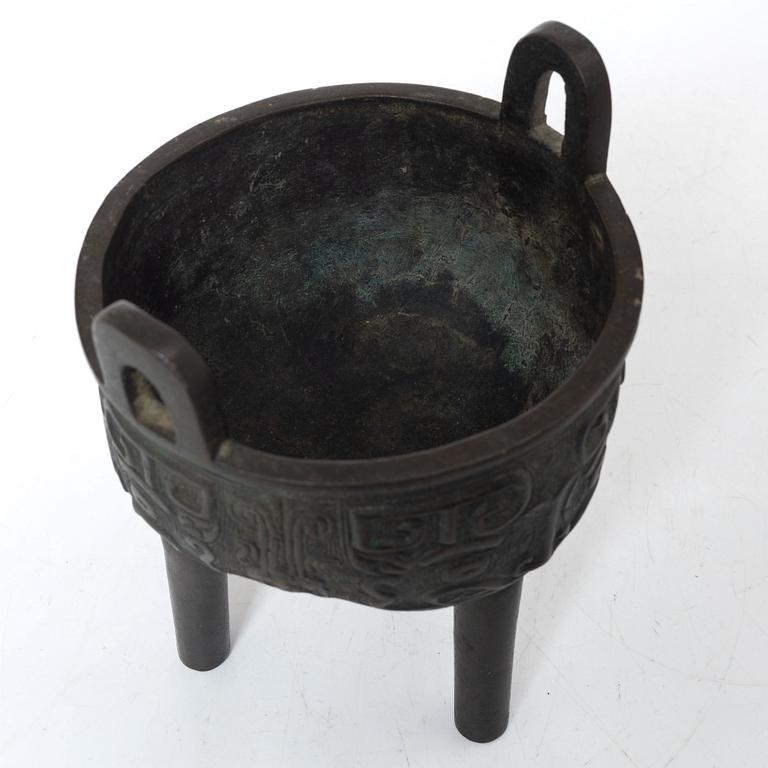 A Chinese tripod bronze censer, Ming style, Qing dynasty (1644-1912).