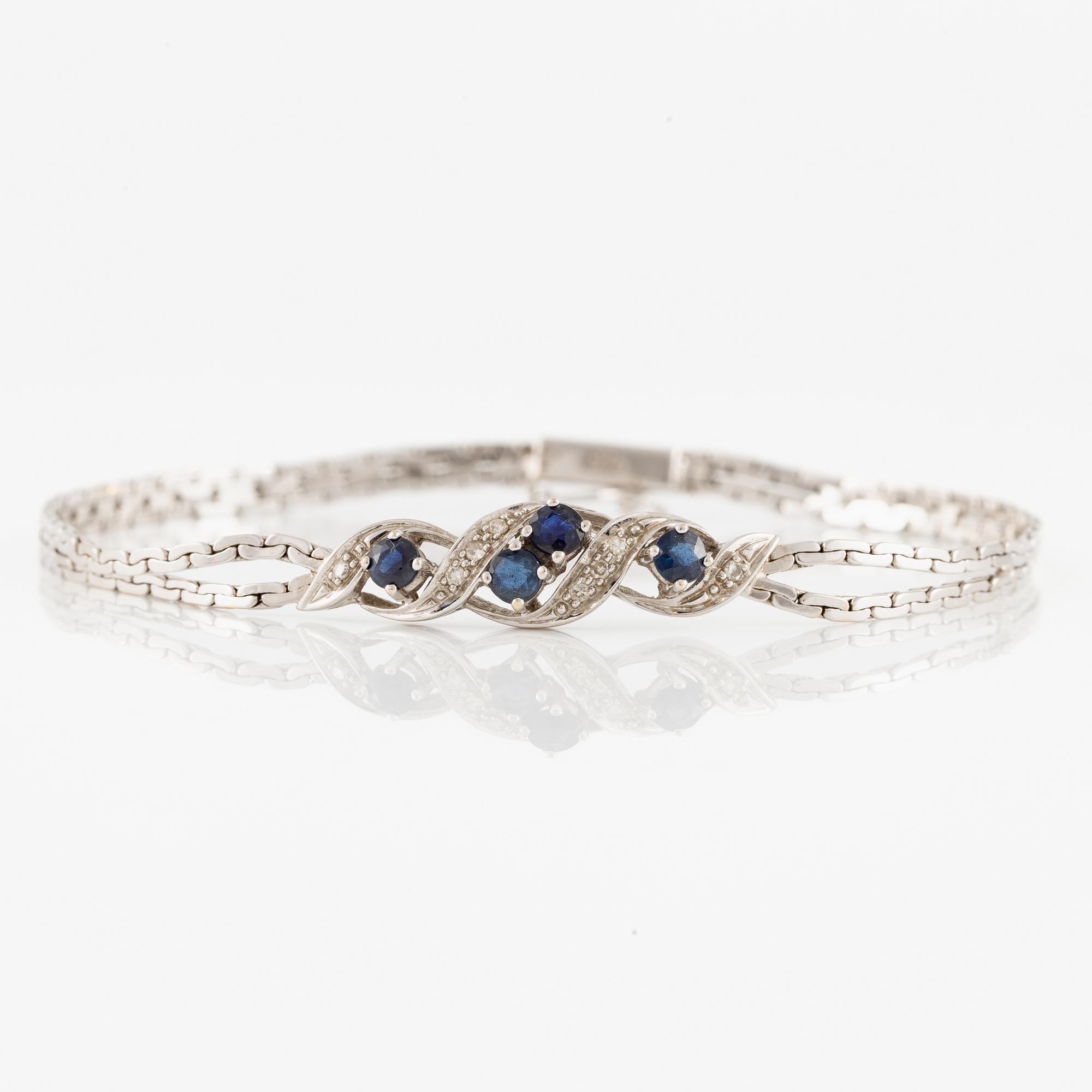 Arm bracelet, 18K white gold with small octagon-cut diamonds and sapphires.