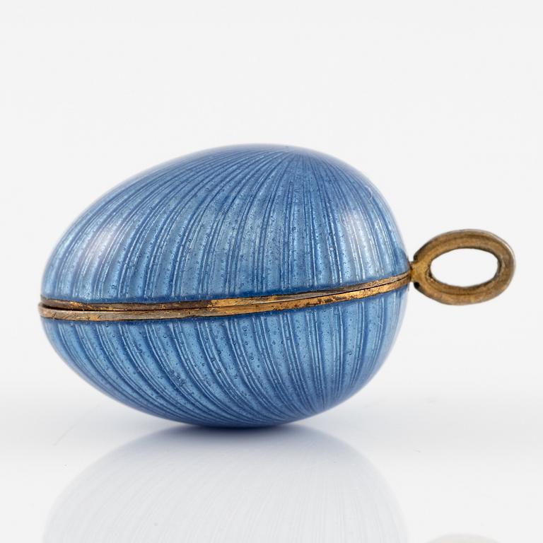 Pendant in the form of an egg, silver and enamel.