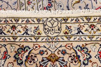 A Keshan carpet, c. 342 x 240 cm.