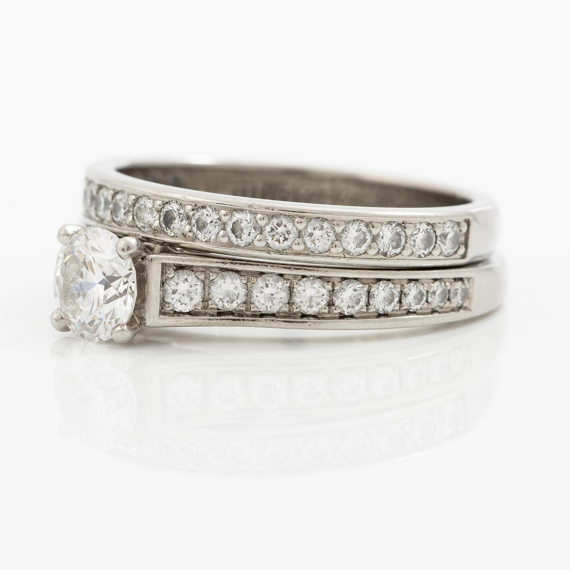 Cartier two rings platinum with round brilliant-cut diamonds.