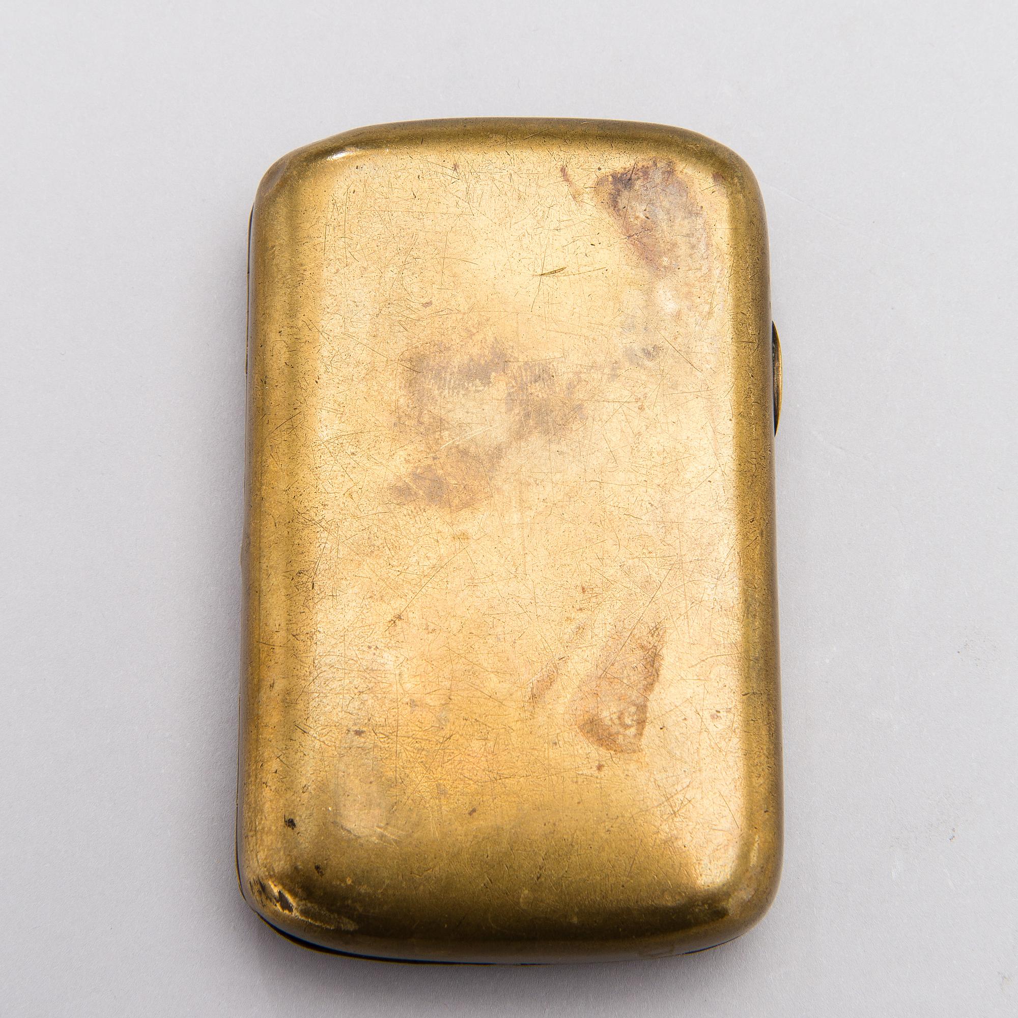 FABERGÉ CIGARETTETUI, mässing 1914-1915.