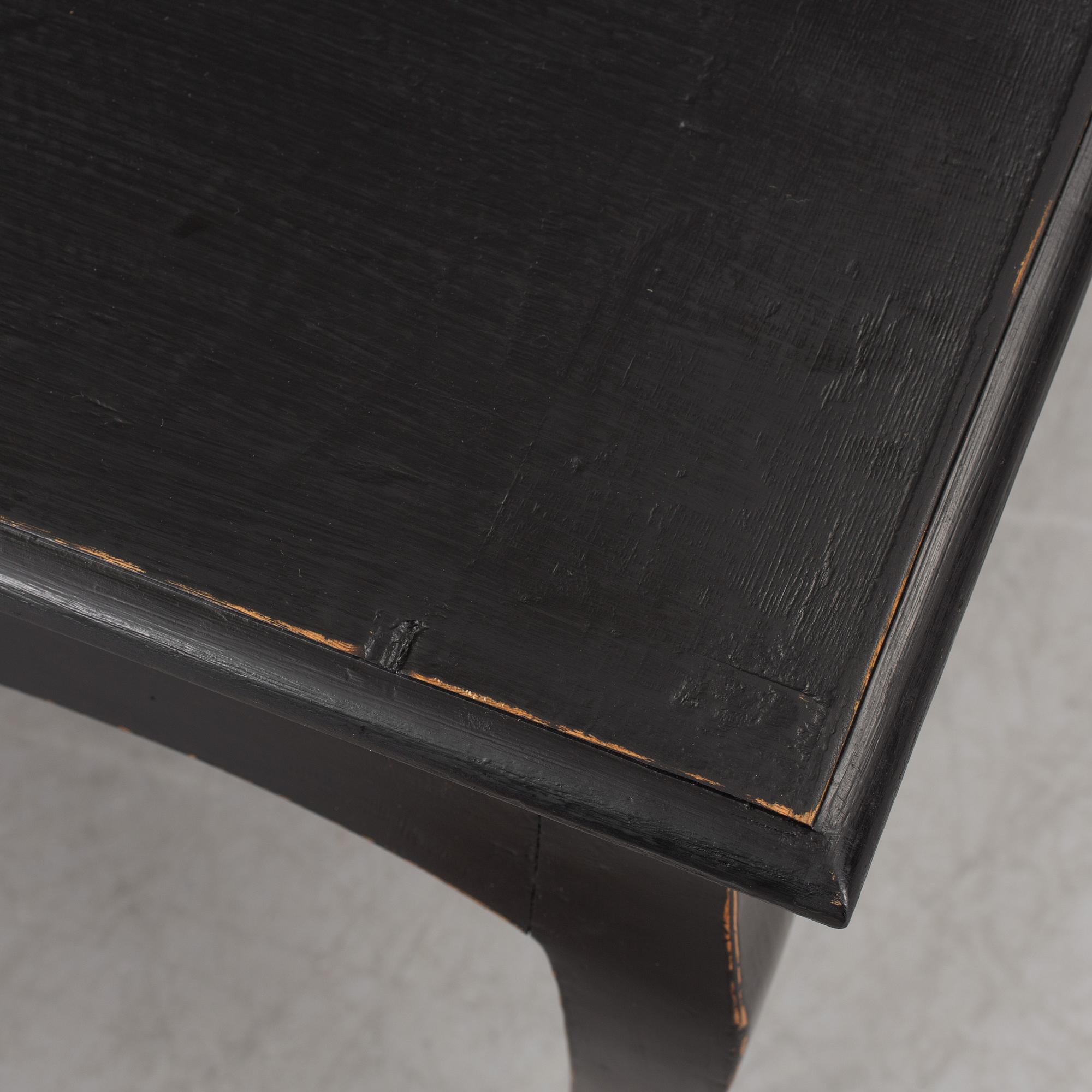A partially rococo, 18th century writing desk.