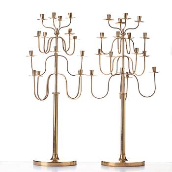 Svenskt Tenn, a pair of Swedish Modern brass candelabra, 1940-50's, probably designed by Josef  Frank.