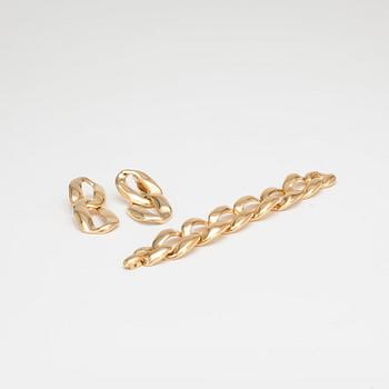 YVES SAINT LAURENT, bracelet with a pair of earclips.