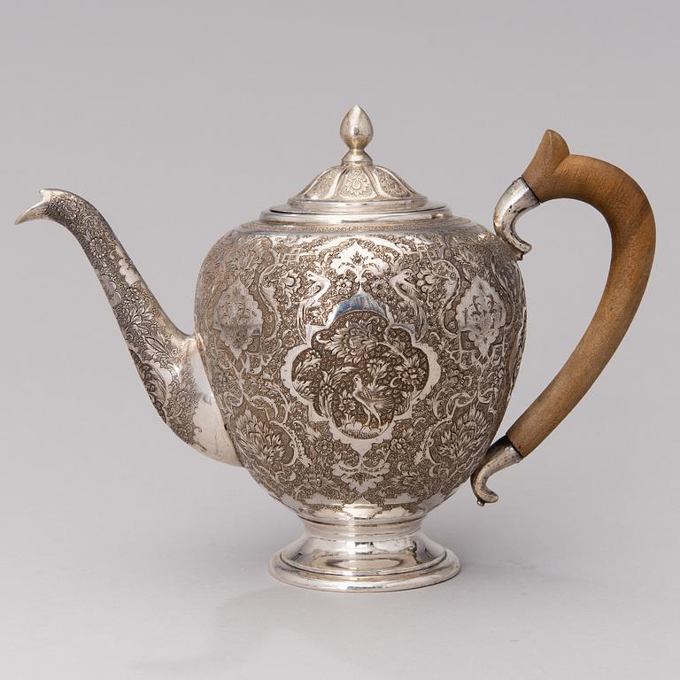 A Persian coffee set in silver, 7 pcs, Iran 20th century. Total weight circa 1334 g.