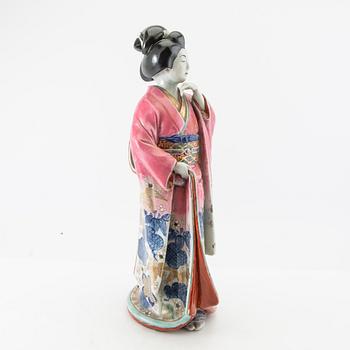 Figure of a geisha, Japan, 20th century, porcelain.