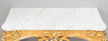 An Art Nouveau mirror with console table from early 20th century.