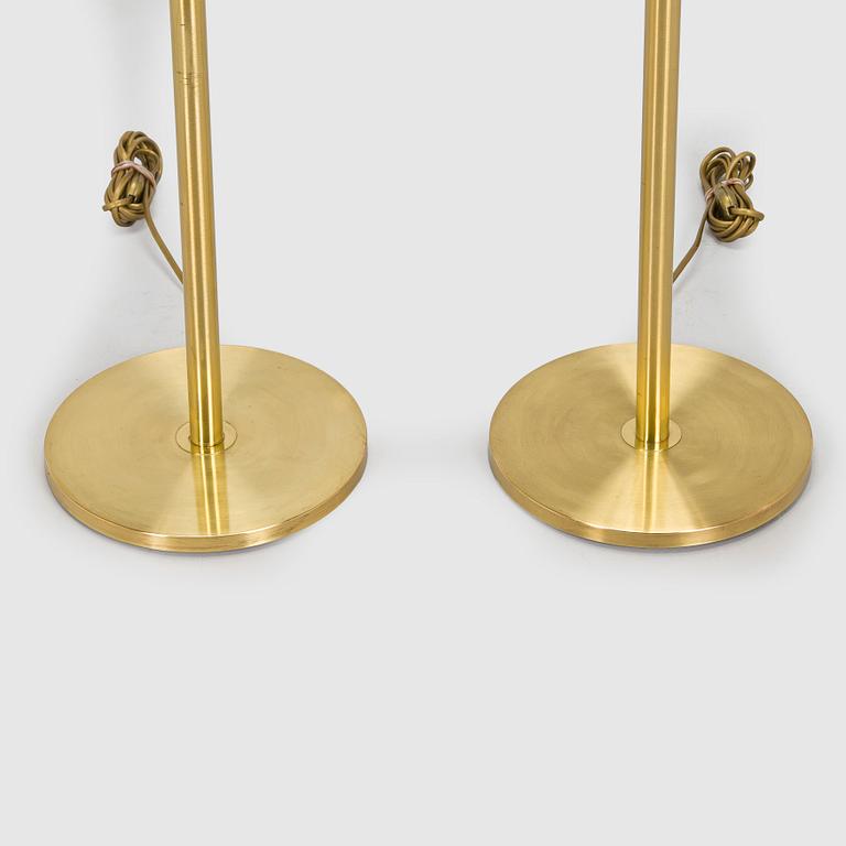 A pair of late 20th century floor lamps.