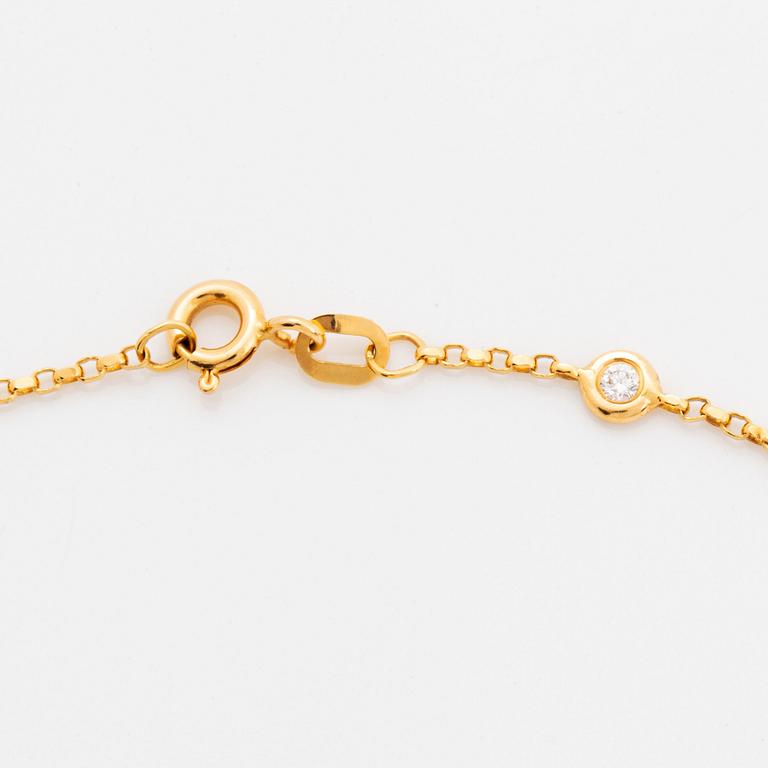 Collier 18K guld med runda briljantslipade diamanter.