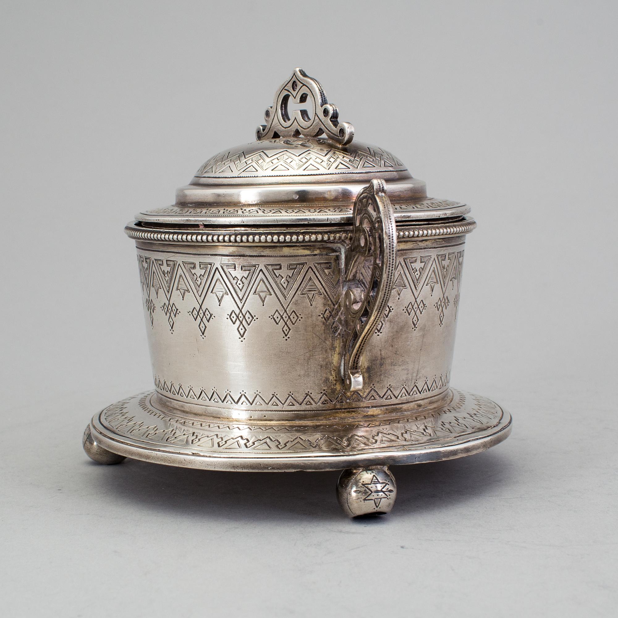 A Russian 19th century parcel-gilt sugar-casket, unidentified makers mark, St. Petersburg 1877.