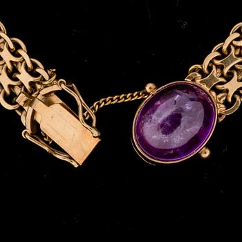 ÄRMLÄNK, 18 k guld med cabochonslipade ametister. Hugo Olsson, Helsingborg, 1971. Vikt ca 22 g.