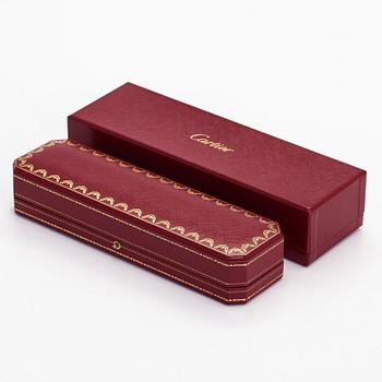 Cartier, an 18K gold "Amulette de Cartier" bracelet with malachite and a brilliant-cut diamond.