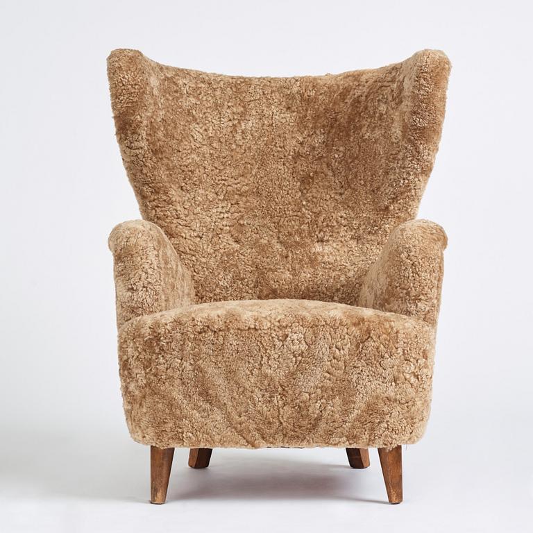 Otto Schulz, a Swedish Modern sheepskin upholstered armchair, Boet Gothenburg 1940s.