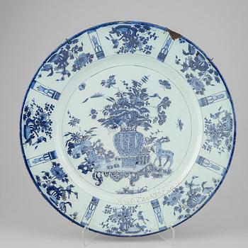 A large faience dish, 18th Century.