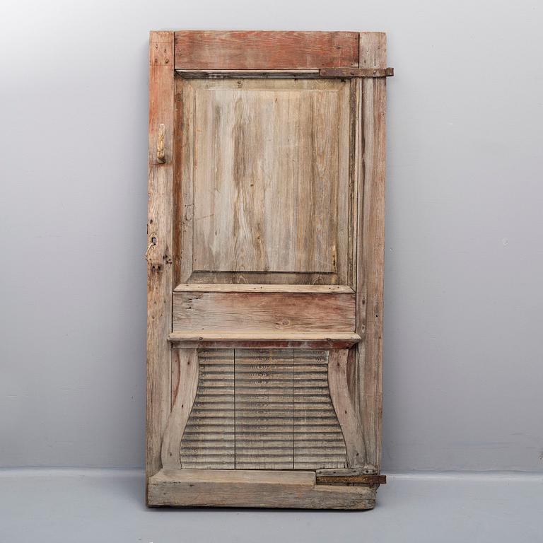 A pinted pine door, 18th /19th Century.