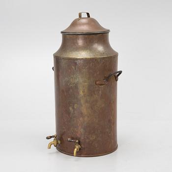 A copper water tank with cover, around 1900.