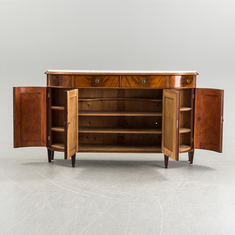 A 20th century marble top sideboard.