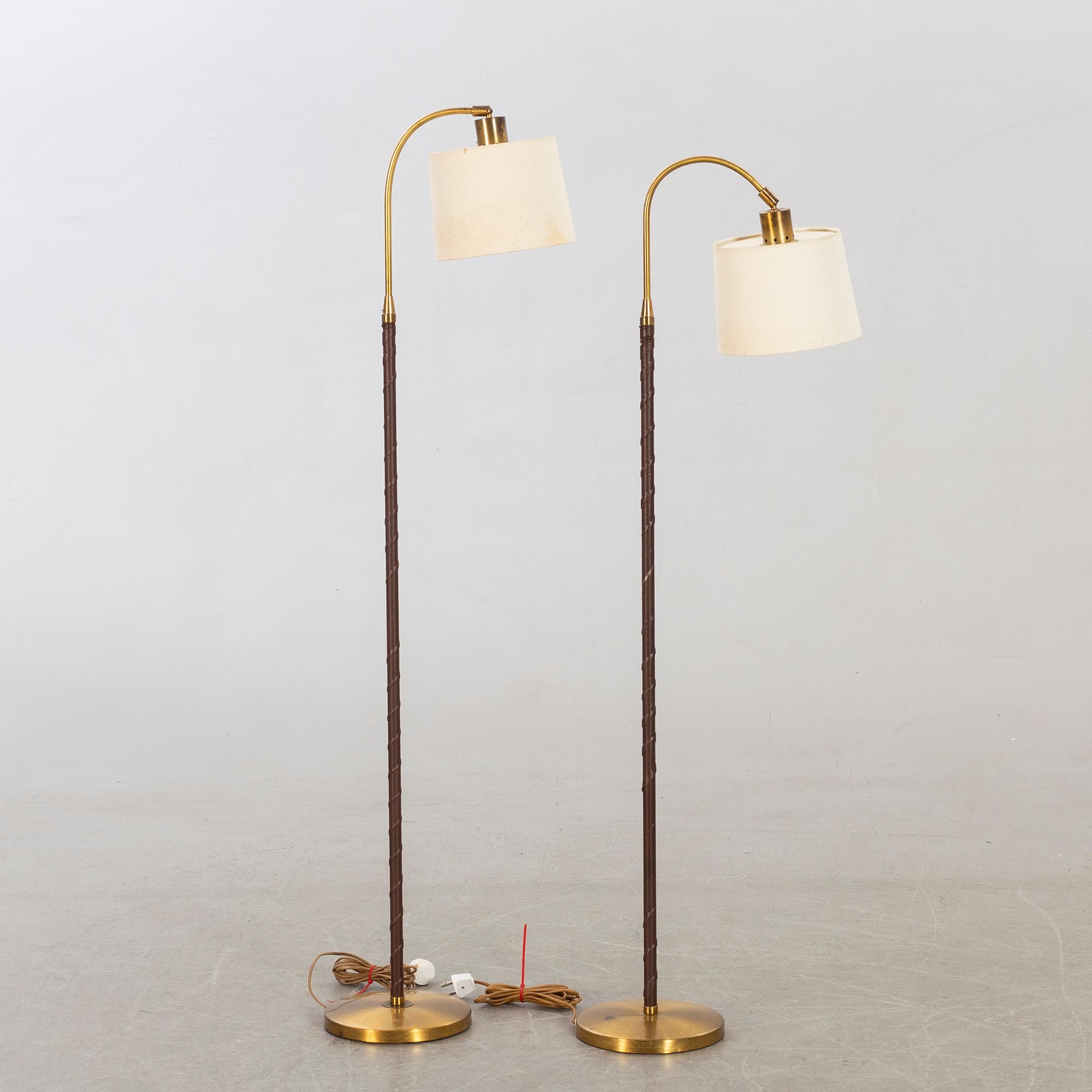 EINAR BÄCKSTRÖM, two  floor lamps mid 20th century.