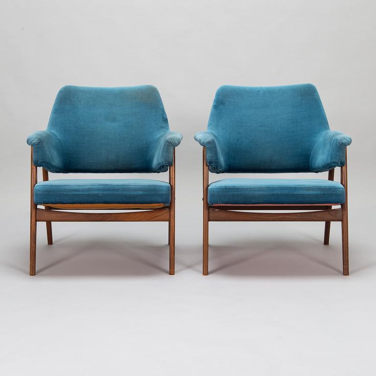 A pair of mid 20th century armchairs.