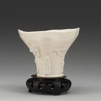 A blanc de chine libation cup, Qing dynasty.