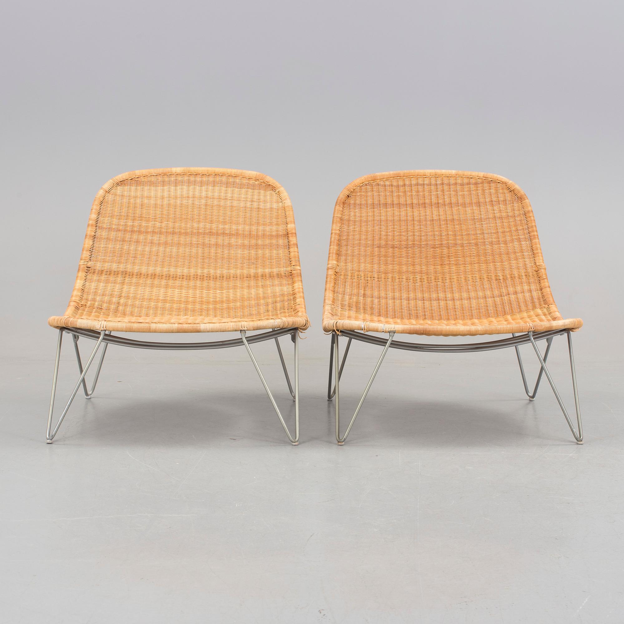 a pair of 21h Century lounge chairs designed by James Irvine, by IKEA.