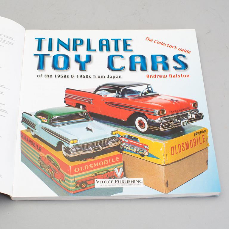 A lot of twelve books regarding tin toys.