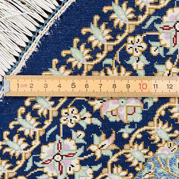 Rug, Ghom, signed, diameter 80 cm.