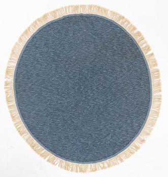 A rug, diameter circa 188 cm.