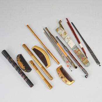 A group of Japanese pins, combs, paper opners and pipes, Meiji period (1868-1912).