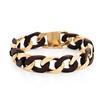 441. A Van Cleef & Arpels 18K gold and wood bracelet.