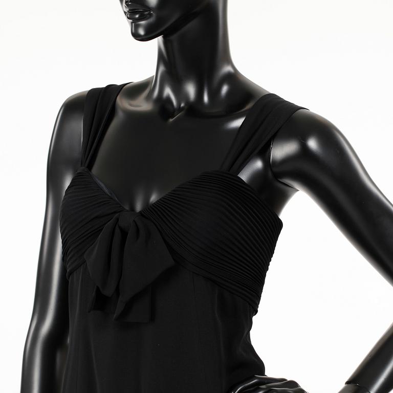 ARMANI, a black long silk dress.