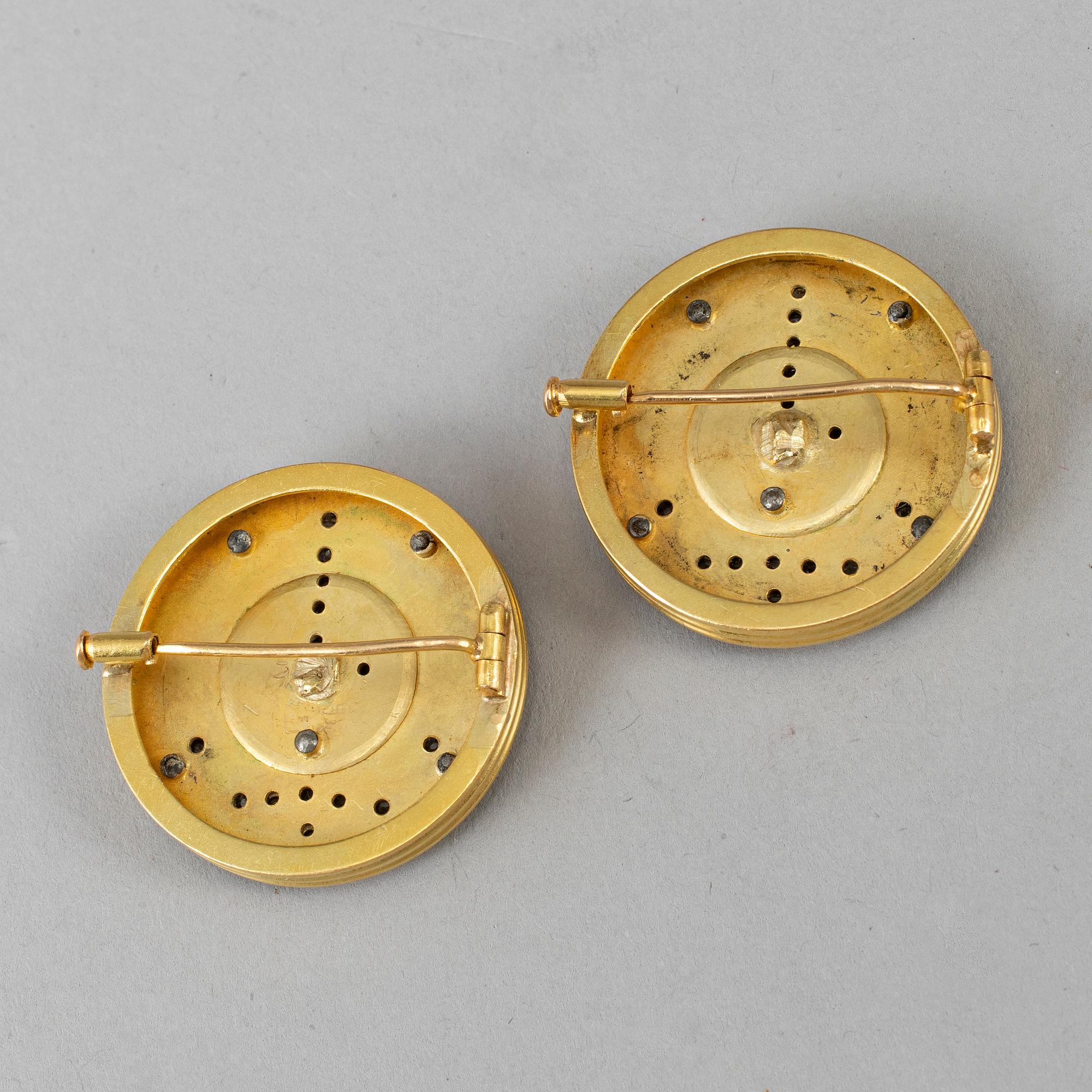 A pair of Russian 20th century gold and diamonds brosches, unmarked.
