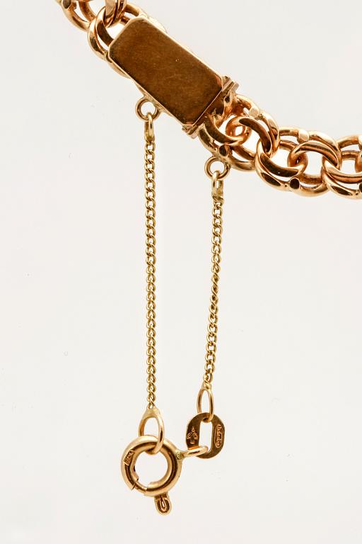 An 18K gold chain. 38g.