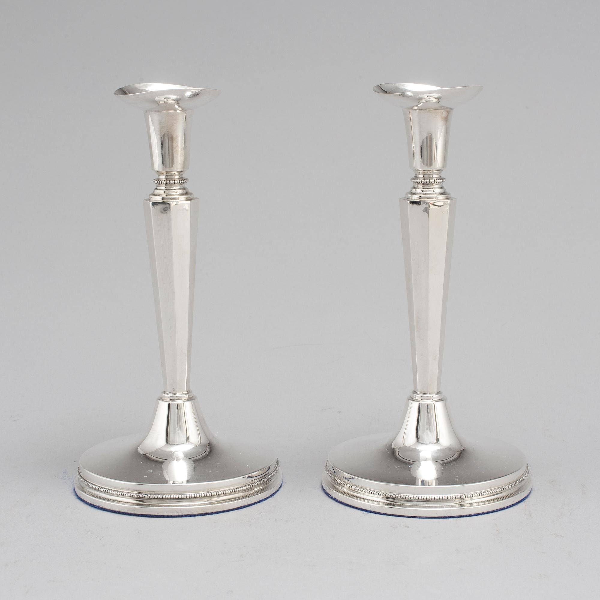 A pair of silver candle sticks by Eric Löfman, Uppsala 1961.