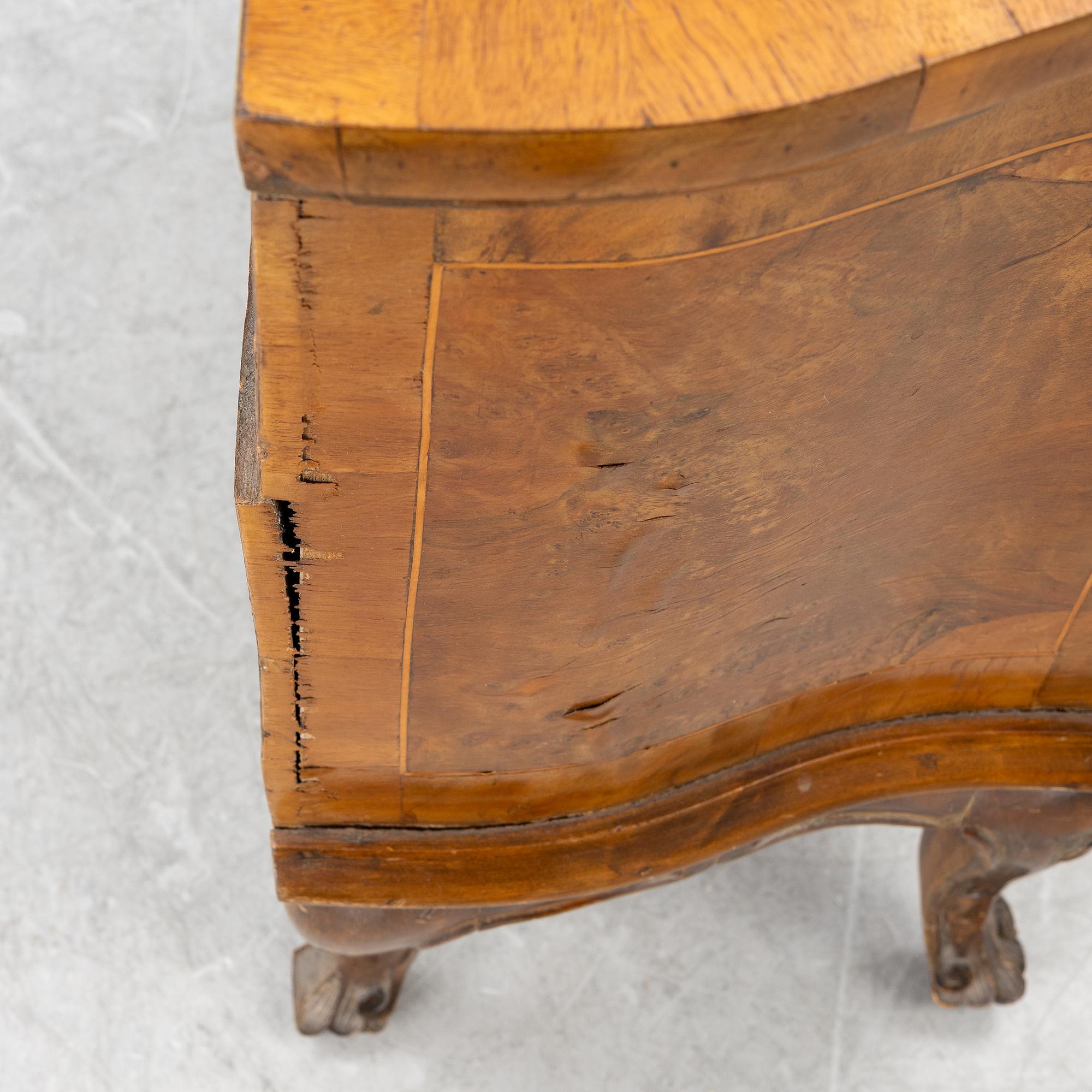 A small neo-Rococo chest of drawers, 19th century.