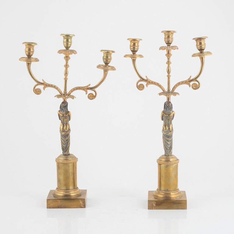 A pair of Empire style candelabra, around 1900.