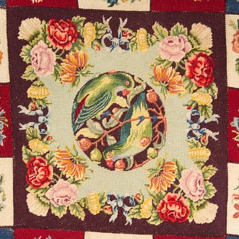 An embroided carpet, 1850-1900. Circa 195 x 130 cm.