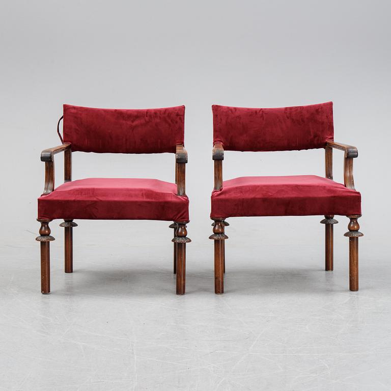A pair of Swedish Grace 1920's armchairs.