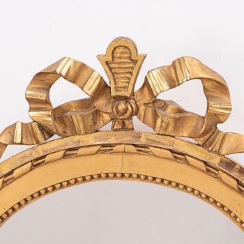 A Gustavian style mirror, early 20th century.