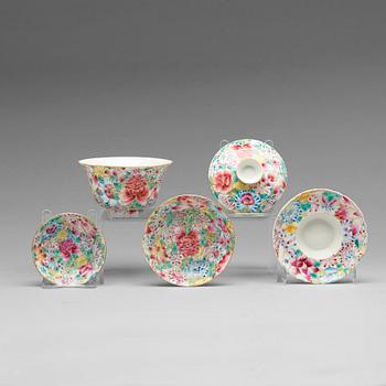 A set of six Chinese 'mille fiori' tea cups with covers and stands, and 12 small dishes, circa 1900.